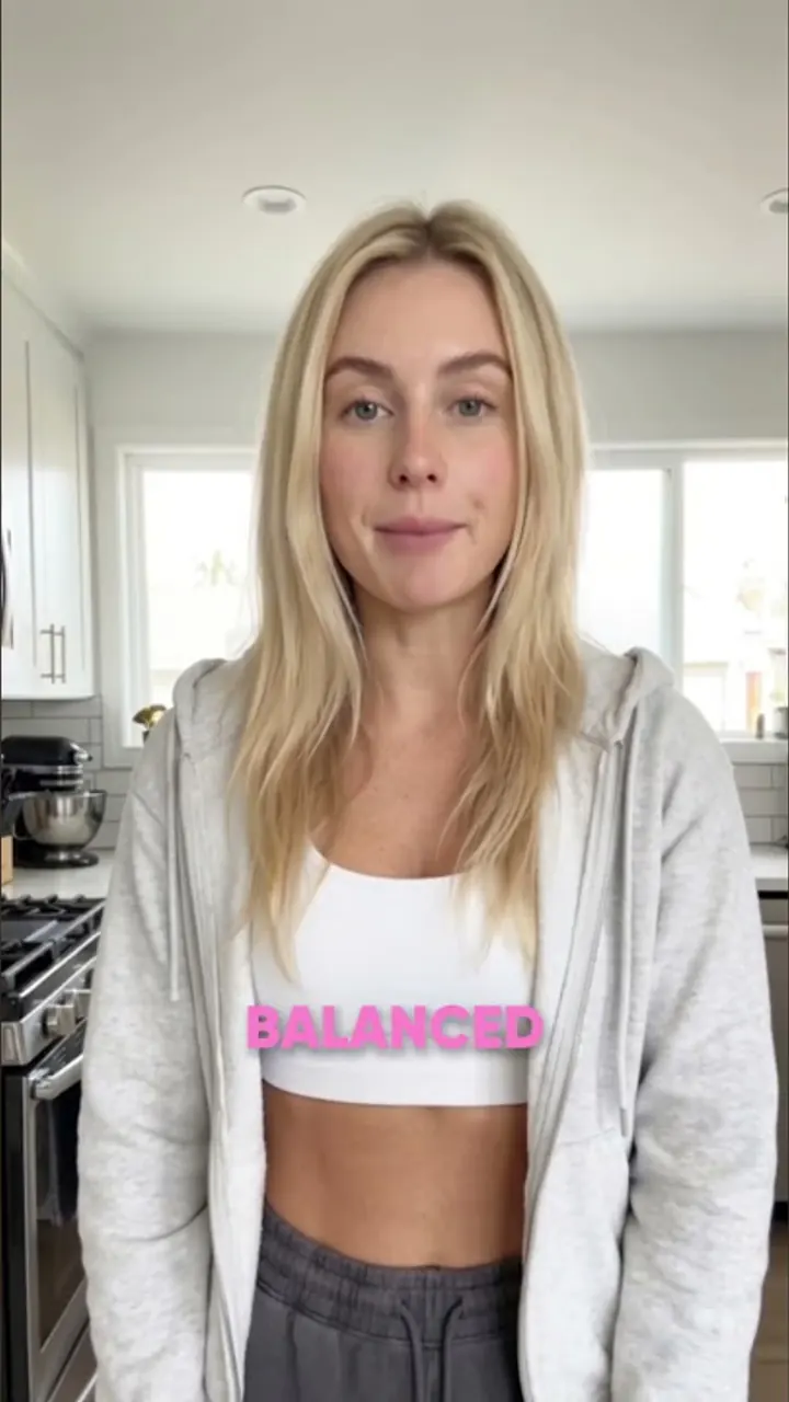 A creator speaking to camera in a bright kitchen setting.
